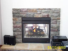 See through inlaid stone fireplace