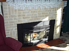 built-in classic brick fireplace